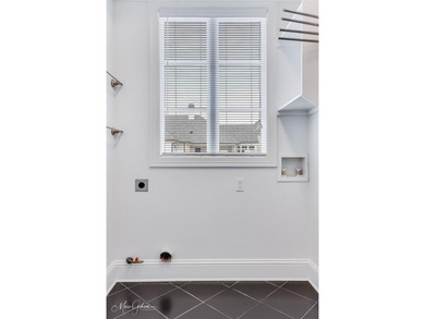 Perfectly positioned on a prime corner lot in Provenance, this on Southern Trace Country Club in Louisiana - for sale on GolfHomes.com, golf home, golf lot