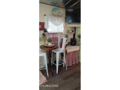 Lovely Cottage style living with 2 bedrooms, 2.5 baths! You must on Lake Tansi Village Country Club in Tennessee - for sale on GolfHomes.com, golf home, golf lot