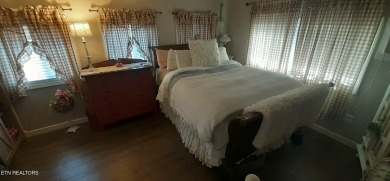 Lovely Cottage style living with 2 bedrooms, 2.5 baths! You must on Lake Tansi Village Country Club in Tennessee - for sale on GolfHomes.com, golf home, golf lot