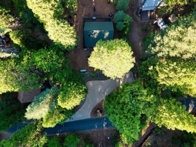 Don't be deceived by its charming rustic facade, this 2 bedroom on Sequoia Woods Country Club in California - for sale on GolfHomes.com, golf home, golf lot