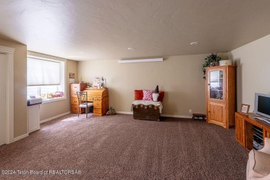 This charming home in Thayne is a golfer's dream, located on the on Star Valley RV Golf Course in Wyoming - for sale on GolfHomes.com, golf home, golf lot