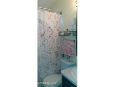 Lovely Cottage style living with 2 bedrooms, 2.5 baths! You must on Lake Tansi Village Country Club in Tennessee - for sale on GolfHomes.com, golf home, golf lot