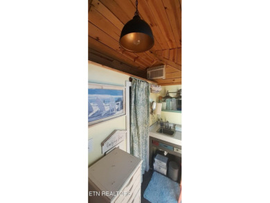 Lovely Cottage style living with 2 bedrooms, 2.5 baths! You must on Lake Tansi Village Country Club in Tennessee - for sale on GolfHomes.com, golf home, golf lot
