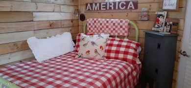 Lovely Cottage style living with 2 bedrooms, 2.5 baths! You must on Lake Tansi Village Country Club in Tennessee - for sale on GolfHomes.com, golf home, golf lot