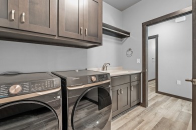 This lovely one-of-a-kind, brand new townhome is a beauty on Cherry Hills Golf Course in Wisconsin - for sale on GolfHomes.com, golf home, golf lot