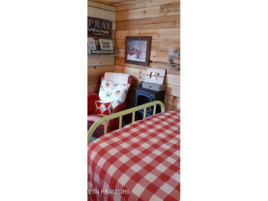 Lovely Cottage style living with 2 bedrooms, 2.5 baths! You must on Lake Tansi Village Country Club in Tennessee - for sale on GolfHomes.com, golf home, golf lot