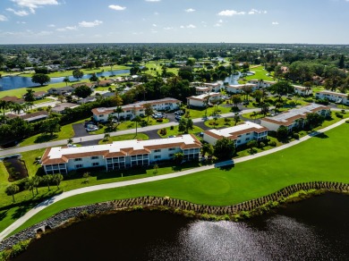 Desirable First Floor condo with a beautiful wide views of the on The Glades Golf and Country Club in Florida - for sale on GolfHomes.com, golf home, golf lot