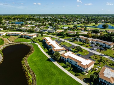 Desirable First Floor condo with a beautiful wide views of the on The Glades Golf and Country Club in Florida - for sale on GolfHomes.com, golf home, golf lot