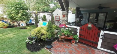 Lovely Cottage style living with 2 bedrooms, 2.5 baths! You must on Lake Tansi Village Country Club in Tennessee - for sale on GolfHomes.com, golf home, golf lot