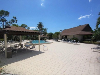 Desirable First Floor condo with a beautiful wide views of the on The Glades Golf and Country Club in Florida - for sale on GolfHomes.com, golf home, golf lot