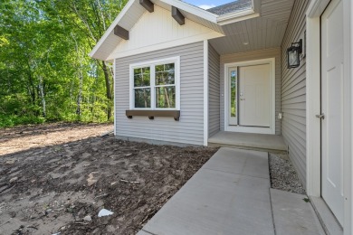 This lovely one-of-a-kind, brand new townhome is a beauty on Cherry Hills Golf Course in Wisconsin - for sale on GolfHomes.com, golf home, golf lot