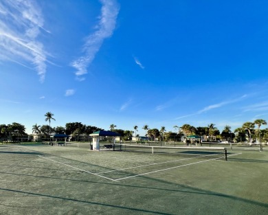 Desirable First Floor condo with a beautiful wide views of the on The Glades Golf and Country Club in Florida - for sale on GolfHomes.com, golf home, golf lot