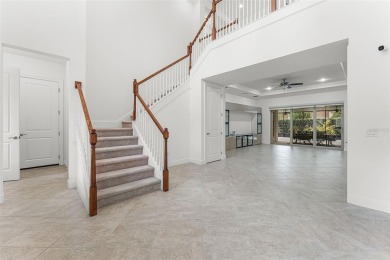 A RARE FIND! THE AVANTI LUXURY MODEL BY TOLL BROTHERS ON A on Eagle Creek Golf Club in Florida - for sale on GolfHomes.com, golf home, golf lot