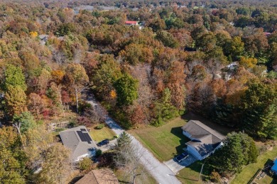 Discover an exceptional opportunity to build your dream home on on Lake Tansi Village Country Club in Tennessee - for sale on GolfHomes.com, golf home, golf lot