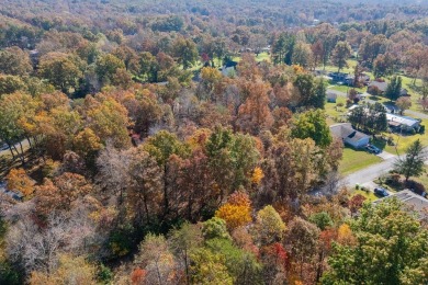 Discover an exceptional opportunity to build your dream home on on Lake Tansi Village Country Club in Tennessee - for sale on GolfHomes.com, golf home, golf lot