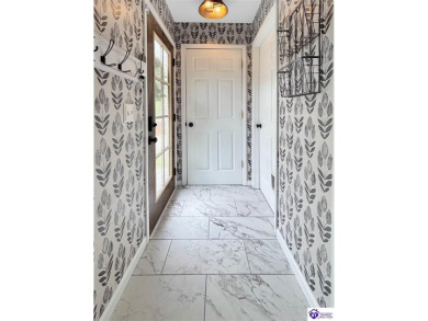 Perfectly positioned across from the golf course, this charming on Elizabethtown Country Club in Kentucky - for sale on GolfHomes.com, golf home, golf lot