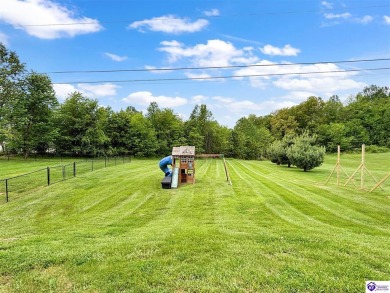Perfectly positioned across from the golf course, this charming on Elizabethtown Country Club in Kentucky - for sale on GolfHomes.com, golf home, golf lot