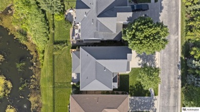 Open House Sat & Sun 2:30-3:30. Welcome to this stunning 5 BR 5 on Pine Lake Golf and Tennis Club in Nebraska - for sale on GolfHomes.com, golf home, golf lot