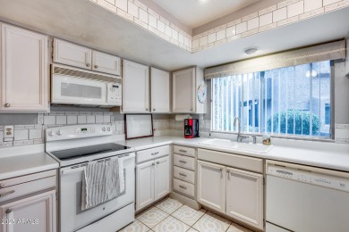 Discover this stunning ground-level condo with sweeping views of on McCormick Ranch Golf Club in Arizona - for sale on GolfHomes.com, golf home, golf lot
