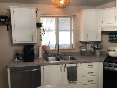 Beautiful 3 bedrooms, 2 bathrooms, high ceilings, 3 car carport on Green River Golf Club in California - for sale on GolfHomes.com, golf home, golf lot