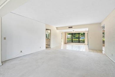 Spacious 2-bedroom, 2-bath first-floor condo overlooking the on Quail Ridge Golf Course and Country Club in Florida - for sale on GolfHomes.com, golf home, golf lot