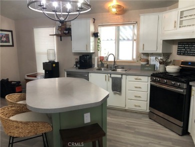 Beautiful 3 bedrooms, 2 bathrooms, high ceilings, 3 car carport on Green River Golf Club in California - for sale on GolfHomes.com, golf home, golf lot