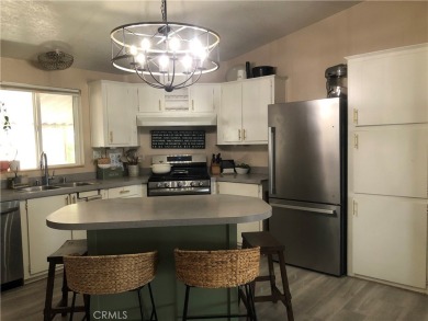 Beautiful 3 bedrooms, 2 bathrooms, high ceilings, 3 car carport on Green River Golf Club in California - for sale on GolfHomes.com, golf home, golf lot