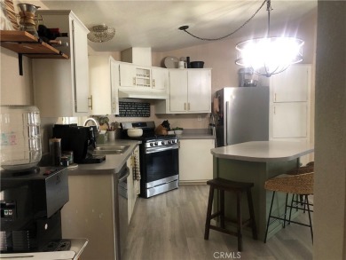 Beautiful 3 bedrooms, 2 bathrooms, high ceilings, 3 car carport on Green River Golf Club in California - for sale on GolfHomes.com, golf home, golf lot
