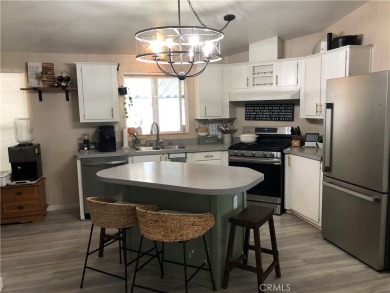 Beautiful 3 bedrooms, 2 bathrooms, high ceilings, 3 car carport on Green River Golf Club in California - for sale on GolfHomes.com, golf home, golf lot