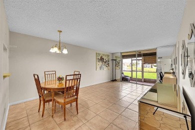 1st Floor, all tile, ground floor, corner unit. Great water on Sunrise Lakes Phase III in Florida - for sale on GolfHomes.com, golf home, golf lot