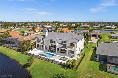 Welcome to *The Cape Royal Retreat*! This stunningly reimagined on Royal Tee Country Club in Florida - for sale on GolfHomes.com, golf home, golf lot