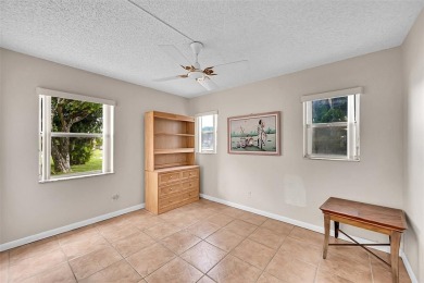 1st Floor, all tile, ground floor, corner unit. Great water on Sunrise Lakes Phase III in Florida - for sale on GolfHomes.com, golf home, golf lot