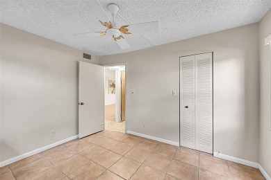 1st Floor, all tile, ground floor, corner unit. Great water on Sunrise Lakes Phase III in Florida - for sale on GolfHomes.com, golf home, golf lot