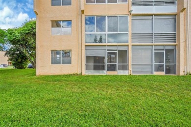 1st Floor, all tile, ground floor, corner unit. Great water on Sunrise Lakes Phase III in Florida - for sale on GolfHomes.com, golf home, golf lot