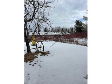 Great Location!  And this one comes with 2 large garages to on Long Lake Country Club in Maine - for sale on GolfHomes.com, golf home, golf lot