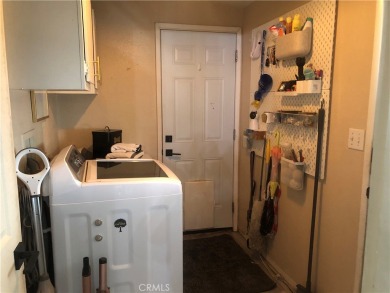 Beautiful 3 bedrooms, 2 bathrooms, high ceilings, 3 car carport on Green River Golf Club in California - for sale on GolfHomes.com, golf home, golf lot