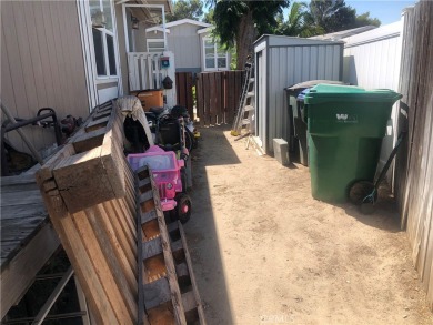 Beautiful 3 bedrooms, 2 bathrooms, high ceilings, 3 car carport on Green River Golf Club in California - for sale on GolfHomes.com, golf home, golf lot