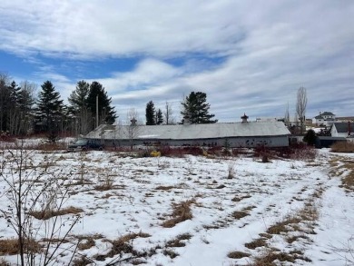 Great Location!  And this one comes with 2 large garages to on Long Lake Country Club in Maine - for sale on GolfHomes.com, golf home, golf lot