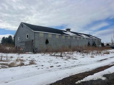 Great Location!  And this one comes with 2 large garages to on Long Lake Country Club in Maine - for sale on GolfHomes.com, golf home, golf lot