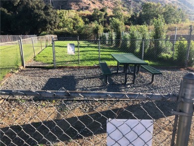 Beautiful 3 bedrooms, 2 bathrooms, high ceilings, 3 car carport on Green River Golf Club in California - for sale on GolfHomes.com, golf home, golf lot