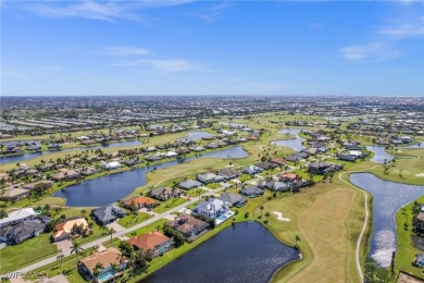 Welcome to *The Cape Royal Retreat*! This stunningly reimagined on Royal Tee Country Club in Florida - for sale on GolfHomes.com, golf home, golf lot