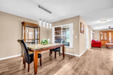 Spacious and updated, this home features one of the most on Highland Lakes Executive Golf Course in Florida - for sale on GolfHomes.com, golf home, golf lot