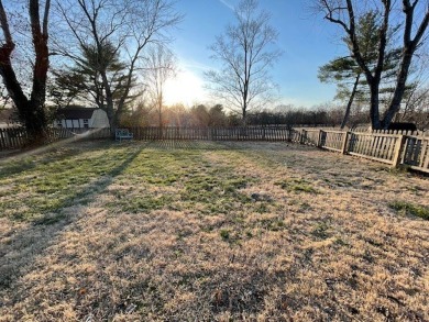 This 4 bed, 2.5 bath ranch style home backs up to fairway 14 of on Hopkinsville Golf and Country Club in Kentucky - for sale on GolfHomes.com, golf home, golf lot