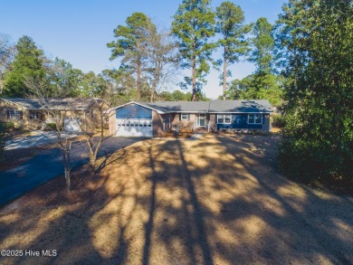 Golf course views from this wonderful fresh brick ranch in on River Bend Golf and Country Club in North Carolina - for sale on GolfHomes.com, golf home, golf lot