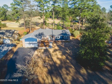 Golf course views from this wonderful fresh brick ranch in on River Bend Golf and Country Club in North Carolina - for sale on GolfHomes.com, golf home, golf lot