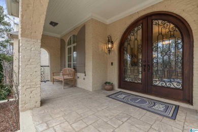 This grand Greystone home is nestled within its wooded  private on Greystone Golf and Country Club-Founders Course in Alabama - for sale on GolfHomes.com, golf home, golf lot