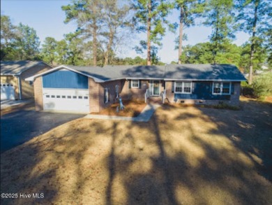 Golf course views from this wonderful fresh brick ranch in on River Bend Golf and Country Club in North Carolina - for sale on GolfHomes.com, golf home, golf lot