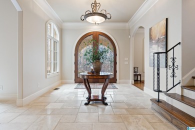 This grand Greystone home is nestled within its wooded  private on Greystone Golf and Country Club-Founders Course in Alabama - for sale on GolfHomes.com, golf home, golf lot