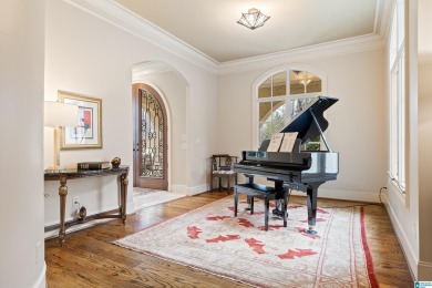 This grand Greystone home is nestled within its wooded  private on Greystone Golf and Country Club-Founders Course in Alabama - for sale on GolfHomes.com, golf home, golf lot