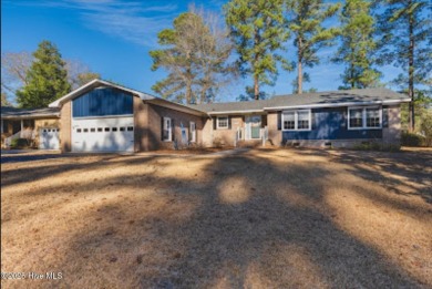 Golf course views from this wonderful fresh brick ranch in on River Bend Golf and Country Club in North Carolina - for sale on GolfHomes.com, golf home, golf lot